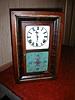 Mantle clock in miniature size with 8-day movement.