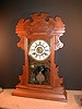 'THE NEWBURGH' Walnut Fancy mantle clock with alarm system.