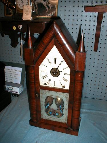 8-Day Steeple clock with reverse painting on lower door glass. — Antique Clocks Price Guide