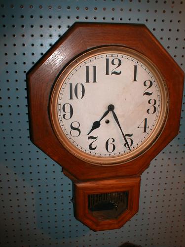 E. Ingraham Clock Company 8-day wall clock with Arabic numerals. — Antique Clocks Price Guide