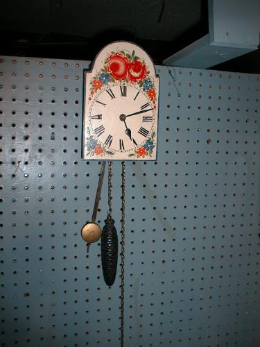 30-hour, pine cone weight powered wall clock. — Antique Clocks Price Guide