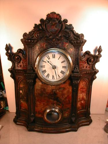 Iron front clock with eight-day mechanism and hourly strike. — Antique Clocks Price Guide