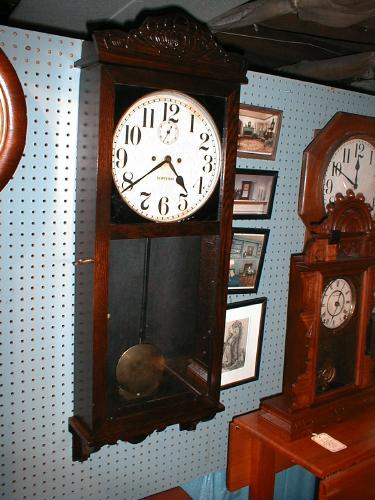 New Haven Clock Company TAMPICO' 30-day wall regulator — Antique Clocks Price Guide