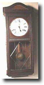 Wall clock with etched glass, c. 1900 — Antique Clocks Price Guide