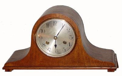 C.1920, German, Kienzle, ÒTambourÓ, or Napoleon hat clock, oak case, 8-day time and strike. — Antique Clocks Price Guide