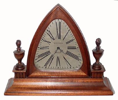 C.1920, Waltham Clock Co., Mass, a desk style picture frame clock in a mahogany case, with lancet shaped silvered dial, 8-day. — Antique Clocks Price Guide