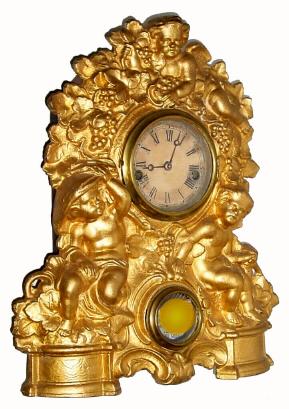 C.1855, American Clock Co., cast metal front shelf clock [Muller], depicting 3 children amongst the grapes. — Antique Clocks Price Guide