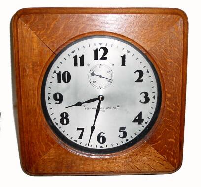 C.1930, Self Winding Clock Co., New York, square oak office clock with rounded corners. — Antique Clocks Price Guide