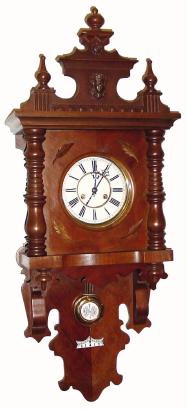 C.1890, German, Berlin Style Free swinger, 8-day time and strike, with porcelain dial and ÓR-AÒ style pendulum. — Antique Clocks Price Guide