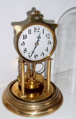 C.1910, German, ÓThe Carp, Ò 400 Day clock with compensating disc pendulum. — Antique Clocks Price Guide