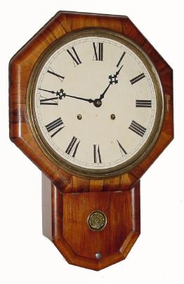 C.1901 William L. Gilbert Clock Co., ÓDrop OctagonÒ, 8-day time/strike rosewood wall clock. — Antique Clocks Price Guide