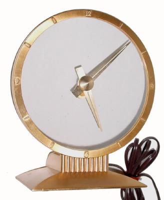 C.1950, Jefferson Electric ÓGolden HourÒ, 110v. mystery desk clock: — Antique Clocks Price Guide