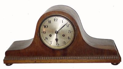 C.1925, German, ÓTambourÒ or Napoleon hat clock, 8-day, gong striking. — Antique Clocks Price Guide