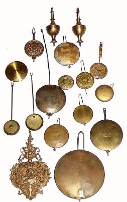 Box lot of 14 assorted foreign and American pendulums, — Antique Clocks Price Guide