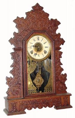 C.1900 William L. Gilbert Clock Co., ÒThe JoyceÓ, 8-day time/strike/alarm oak mantel clock. — Antique Clocks Price Guide