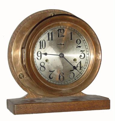 C.1940 The Ashcroft Mfg. Co., New York , 8-day engine room timepiece in a heavy cast red brass case with silvered dial. The case and dial were manufactured by Ashcroft with a No. 10 double wind movement supplied by Seth Thomas. — Antique Clocks Price Guide