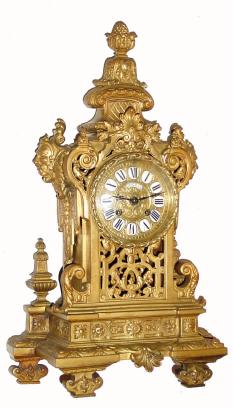 C.1890 Japy Freres, 8-day time/strike French architectural cast brass mantel clock. The dial is signed with a porcelain insert that reads: ÒPhilippe Ft, 66 Palais Royal 67Ó. The movement is also marked ÒP N a ParisÓ. — Antique Clocks Price Guide