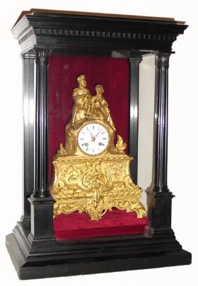 C.1850, French, Japy Freres, 8-day bell strike silk suspension gilt mantel clock. The clock sits in a very nicely made ebonized wood and glass case. — Antique Clocks Price Guide