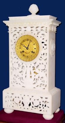C.1840, French, Pons, Empire Style Mantel clock, case of carved and pierced white alabaster, the pendulum a cast and chased butterfly, showing thorough the piercing. — Antique Clocks Price Guide