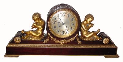 C.1919, Chelsea Clock Co., 8-day time and house strike lever movement mantel clock, extraordinary, cherubs playing flutes. — Antique Clocks Price Guide