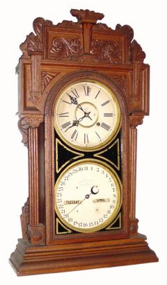 C.1912, Waterbury Clock Co., ÒCalendar No. 43Ó, Ò double dial perpetual calendar, in oak. — Antique Clocks Price Guide