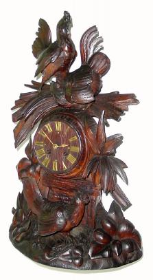 C.1880, French, ÒThree RoostersÓ carved oak mantel clock, with good bell strike movement, and brass Roman numerals and hands. — Antique Clocks Price Guide