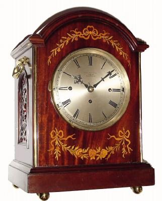C.1890, English, 3-Fusee, Double Chime, 8-Bell bracket clock, mahogany, with fine inlay and fretted sides, medium size (see also lot 428). — Antique Clocks Price Guide