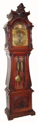 C.1890, American Oak Tall Case. Asian motif, now with a brass dial, moon phase / calendar movement, signed G. W. Russell, Philadelphia, from the same period. — Antique Clocks Price Guide