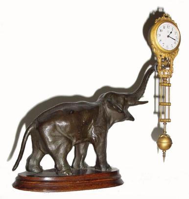 C.1905, German, Junghans, ÓELEPHANTÒ, 8-day, swinging arm timepiece. — Antique Clocks Price Guide