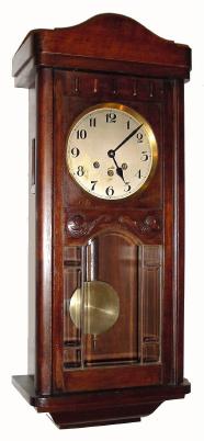 C.1915, German, Westminster Box clock, 8-day quarter chime wall clock, mahogany case with a large 7 beveled pane insert in the door and applied carving. — Antique Clocks Price Guide