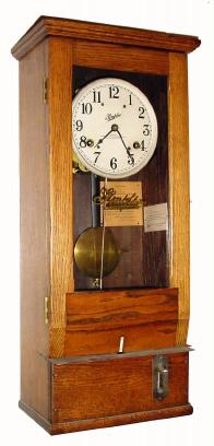 C.1935, Simplex Time Recorder Co. Gardiner, Mass, oak cased 8- day time punch clock, Model T-10. — Antique Clocks Price Guide