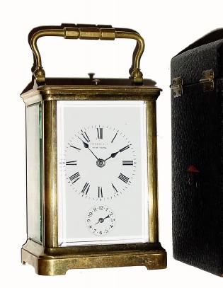 C.1900, French for Tiffany and Co, NY, brass cased carriage clock, time, strike and repeat with alarm, with original travel case. — Antique Clocks Price Guide