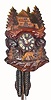C.1935, German, 30-hour time/strike cuckoo clock, in Bavarian Chalet motif. Little windows on each side the cuckoo door light up from a battery activated by the cuckoo. 