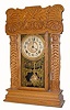 C.1915, E. Ingraham, ÓARCTICÒ pressed oak gingerbread from their Ocean series, 8-day time and strike. 