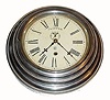 C.1885, Waterbury, Ò8 Inch LeverÓ in a nickeled brass case with wooden back, 8-day timepiece with seconds hand. 