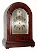C.1905, German, 3/4 Westminster Chime mantel clock in a round top mahogany case. 
