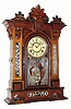 C.1885, Wm. L. Gilbert, ÓAMPHIONÒ, walnut cased, beveled etched mirror side parlor clock. 