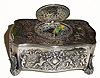 C.1950, Swiss, Singing Bird Box in a silver [.925] embossed case, and with brightly colored enamel scene on the bird cover.