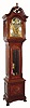 C.1890, German, Korfhage, (Patent 1885), for J. E. Caldwell, PhiladÕa, quarter chime tall clock with 8-bells and 5 gongs, in a well proportioned oak case with carved accents. 