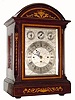 C.1890, English, 3-Fusee, Double Chime, 8-Bell bracket clock, mahogany, with fine inlay and fretted sides, large (see also lot 431). 