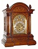 C.1895, German, Winterhalder and Hofmeier, 3-chain fusee, 9-gong quarter chime bracket clock, inlaid walnut case with arch dial and subsidiary dials for F/S, Chime/Silent, and tune selection (Whttington 8 gong, or Westminster 4 gong), striking the hours on a 9th deep toned cathedral gong. 