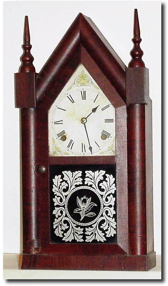C.1880, Waterbury Clock Co, 30-Hour steeple with a Gilbert 8-day dial, and with incorrect hands and no pendulum. — Antique Clocks Price Guide