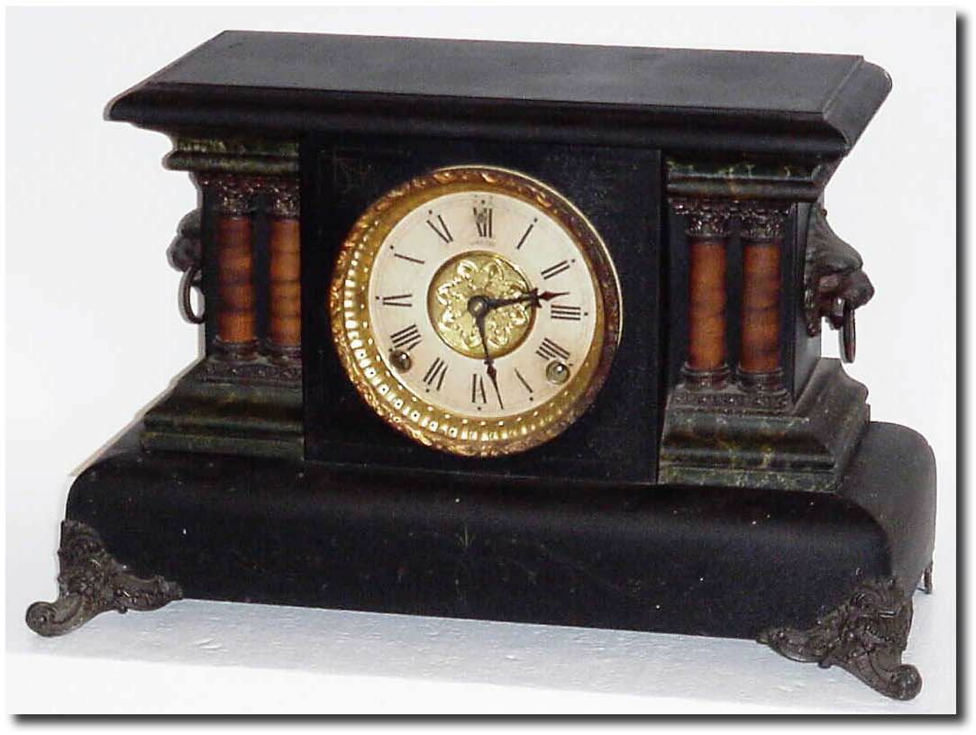 C.1900, E.N. Welch, Black Enamel over wood shelf clock in very good original condition, dirty. — Antique Clocks Price Guide