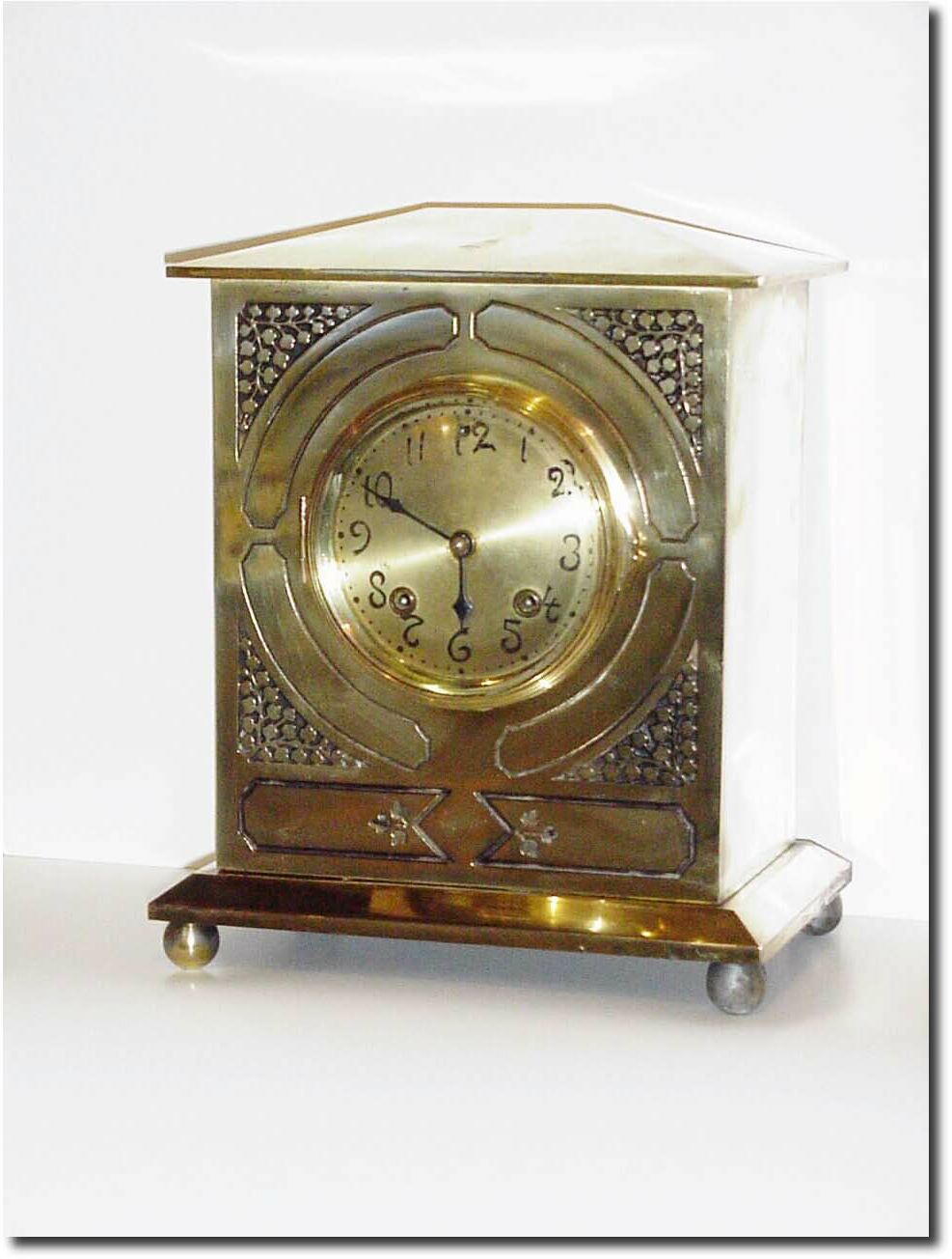 C.1910, Ansonia, Brass over Iron from their "Colonial Brass Finish' series (there are 9 of these). — Antique Clocks Price Guide