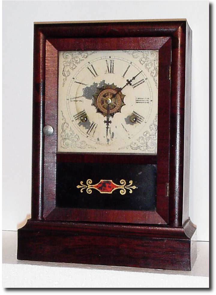C.1881, Waterbury "Cottage Extra', rosewood in good original condition. — Antique Clocks Price Guide