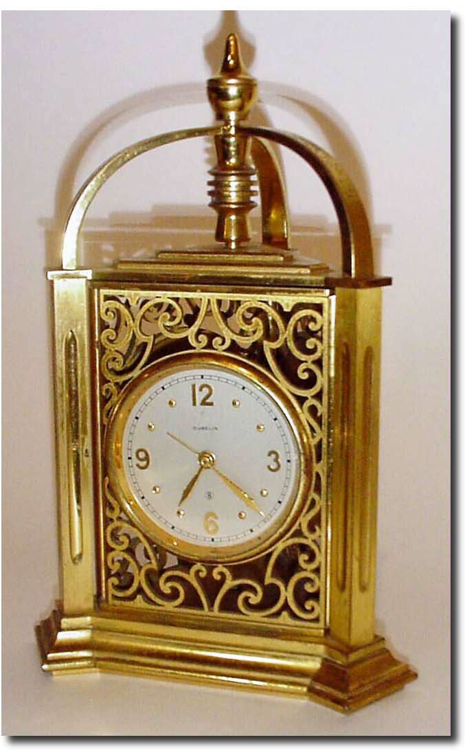 C.1955, Swiss, Gubelin, 3-Sided Desk Frame with, with 8-day clock, thermometer and barometer. — Antique Clocks Price Guide