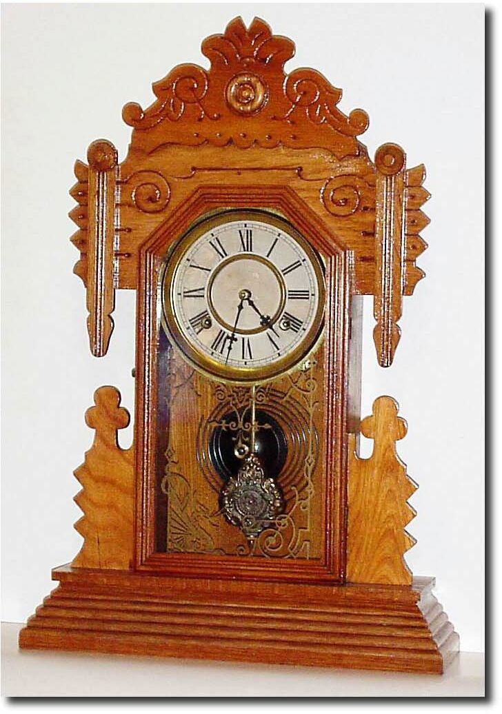 C.1895, Attleboro Clock Co., Attleboro, Mass, very uncommon gingerbread clock in very good original condition. Included with this clock is information compiled by Jim Erickson, the Attleboro guru on the Internet. — Antique Clocks Price Guide