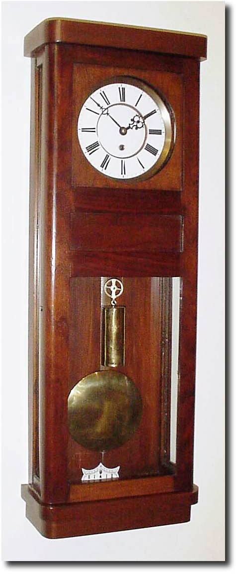 C.1920, German, Walnut Box Wall Clock, now with a different single weight movement, by Gustav Becker, C.1880 serial no. 535065. — Antique Clocks Price Guide