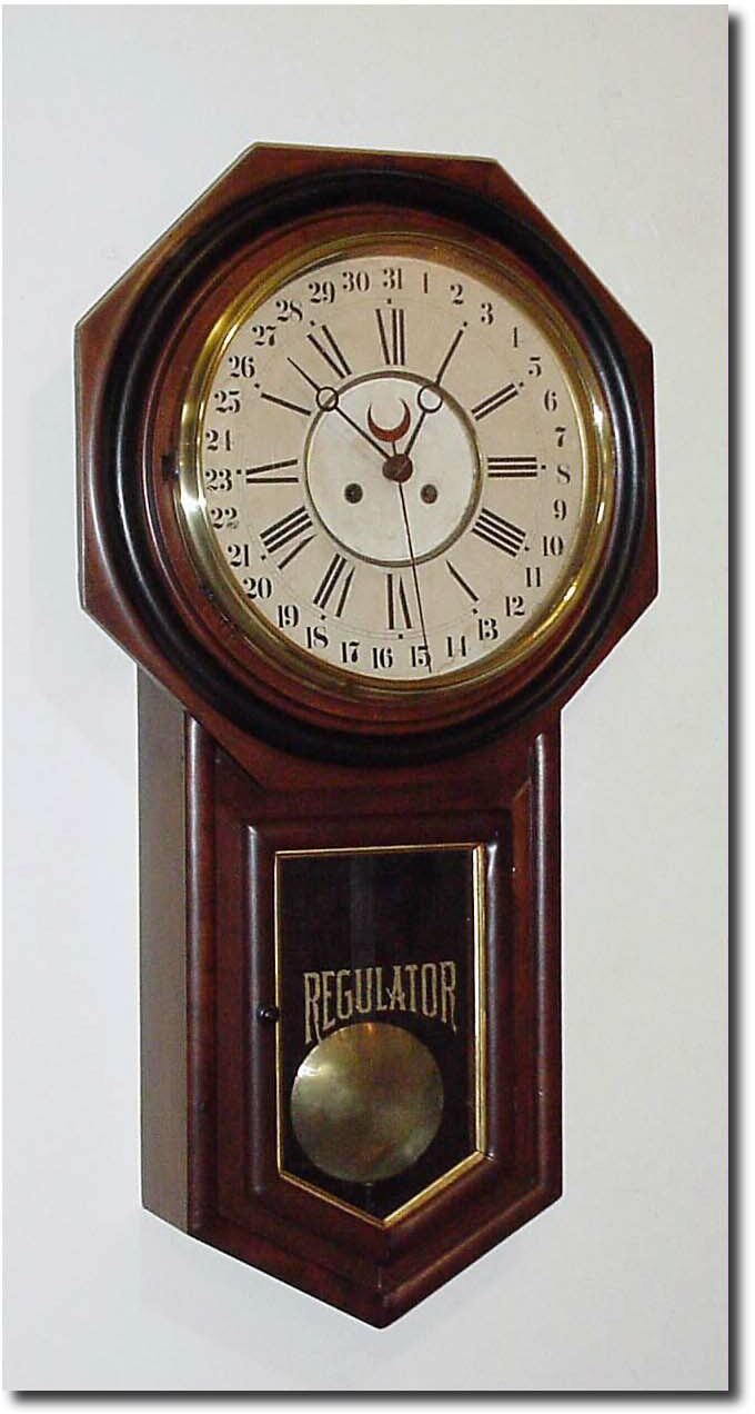 C.1910, German copy of the American long drop calendar, 8-day, time and strike. — Antique Clocks Price Guide