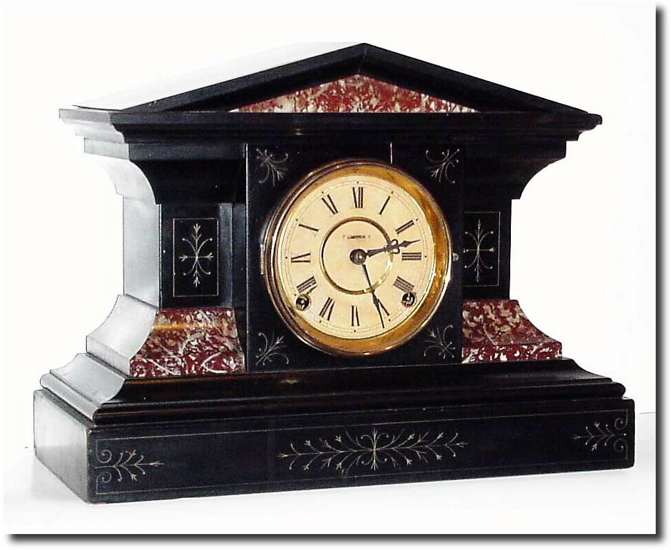 C.1890, Metropolitan Mfg Co., 32 Cortlandt St, NY "Eclipse' (on good rear label w/tear), a good black enamel over wood mantel clock by E. Ingraham. — Antique Clocks Price Guide